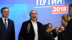 Ο Βλαντίμιρ Πούτιν επανεκλέγεται συγκεντρώνοντας το 76,65% των ψήφων με το 99% των ψηφοδελτίων καταμετρημένο